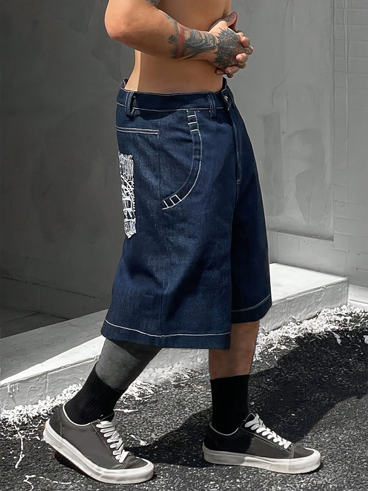 Afslappede bermudashorts i denim – løs pasform med elegant blomsterbroderi