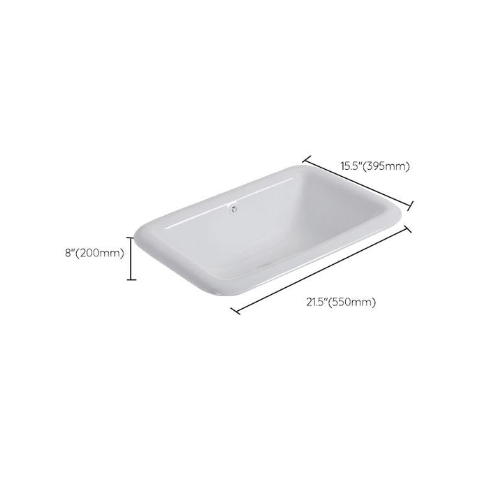 Nedfældet keramisk håndvask i hvid med afspærringsventil