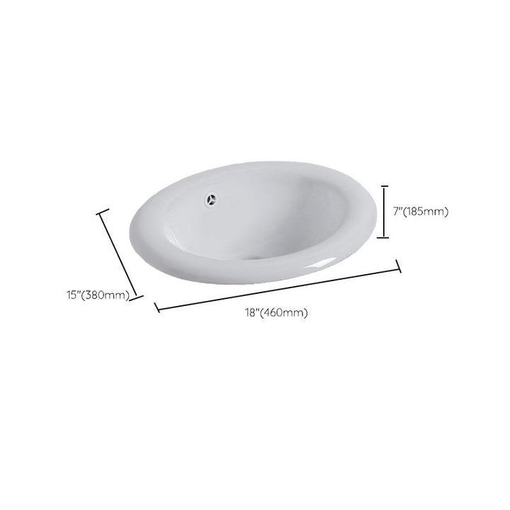 Nedfældet keramisk håndvask i hvid med afspærringsventil