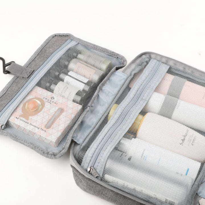 Travelique rejsetoilettaske | Kompakt og vandtæt | Med 4 rum og 360° krog | Til kvinder og mænd