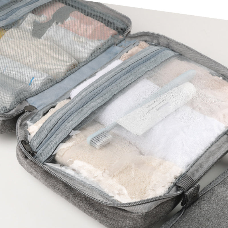 Travelique rejsetoilettaske | Kompakt og vandtæt | Med 4 rum og 360° krog | Til kvinder og mænd