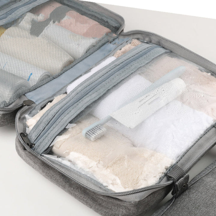 Travelique rejsetoilettaske | Kompakt og vandtæt | Med 4 rum og 360° krog | Til kvinder og mænd