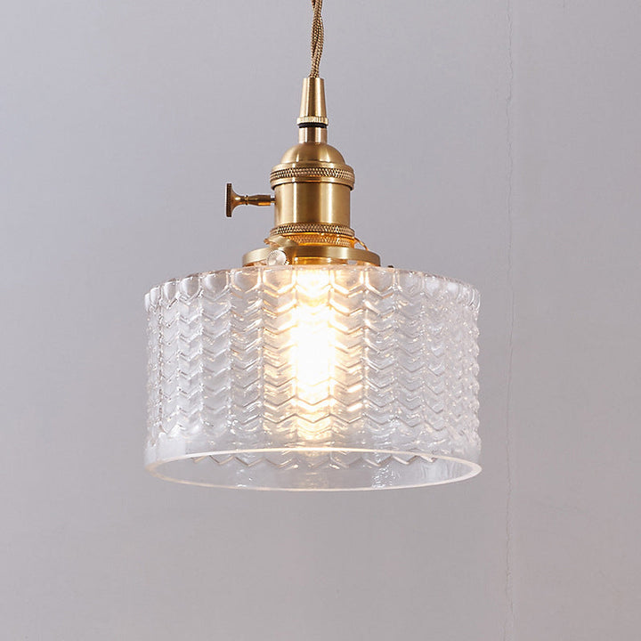 Kort cylindrisk retro pendellampe i bølget glas, klar/grøn med messing drejekontakt