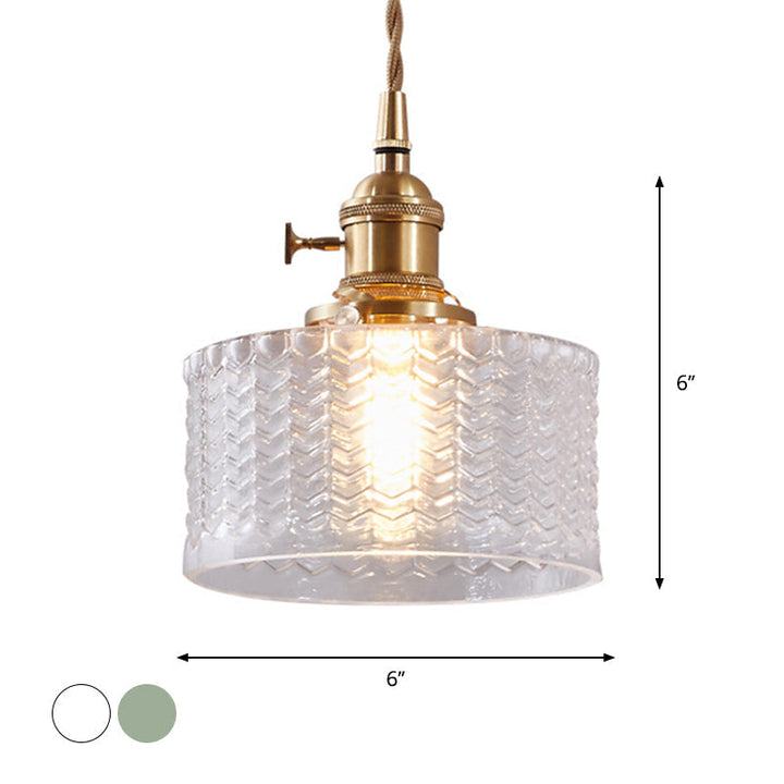 Kort cylindrisk retro pendellampe i bølget glas, klar/grøn med messing drejekontakt