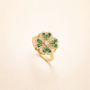 Elegant guldring med drejende kløverblad