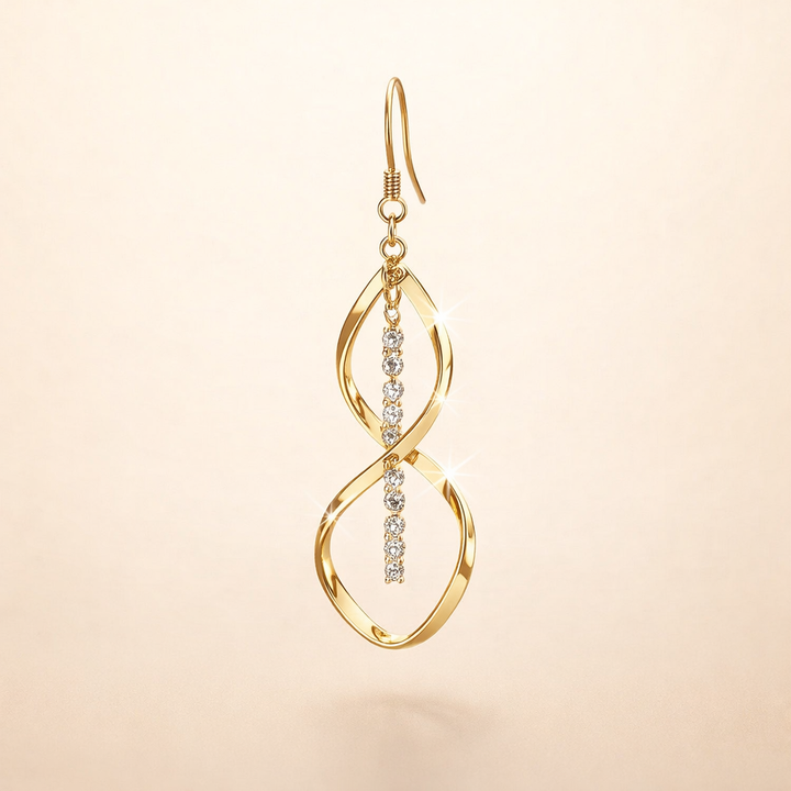 Spiraløreringe i guld med et elegant design