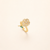 Elegant guldring med drejende blade