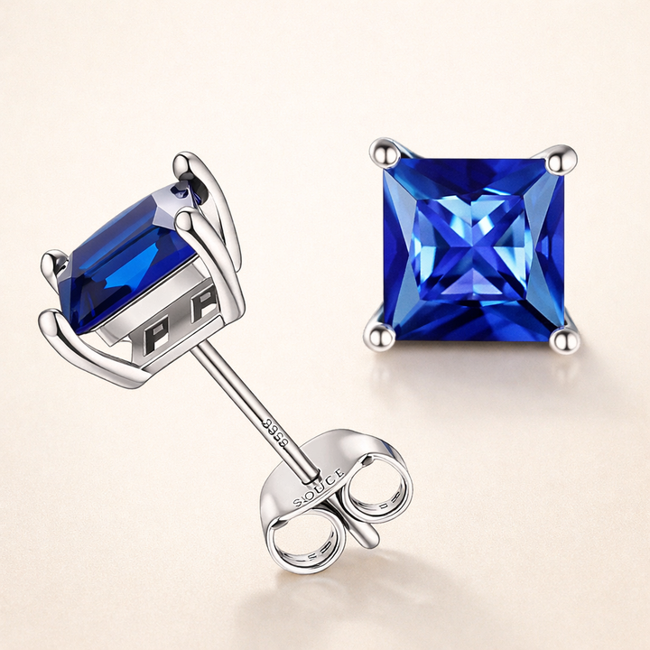 Elegante øreringe i hvidguld med safir i prinsessesliben