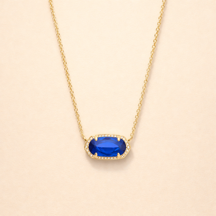 Elegant guldhalskæde med oval safir