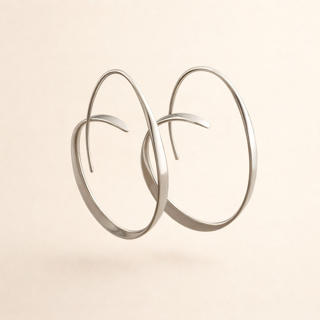 Elegante guldøreringe med en raffineret spiralform