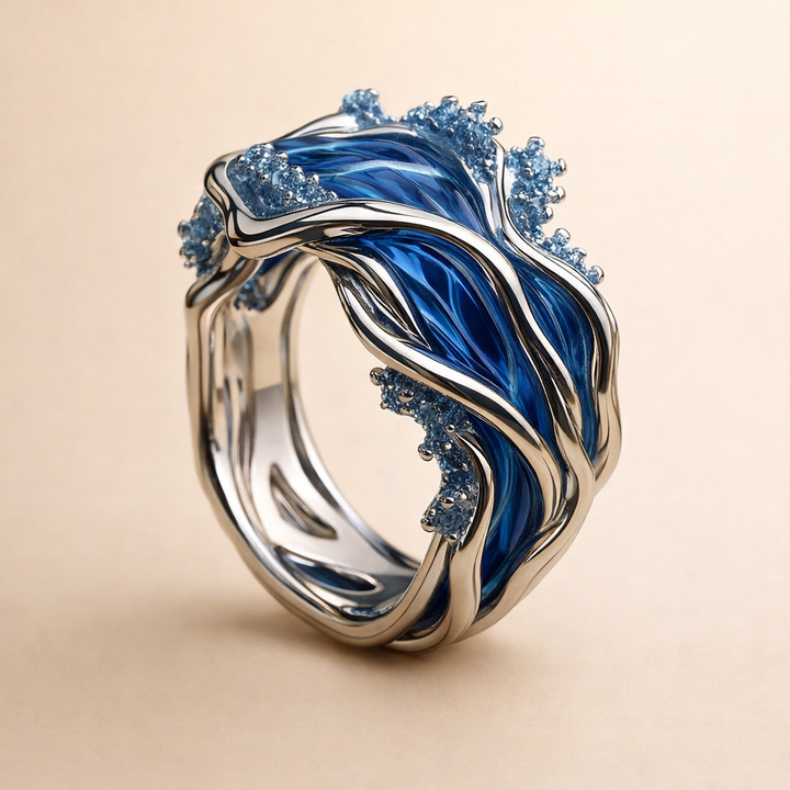 Elegant guldring med bølgemotiv