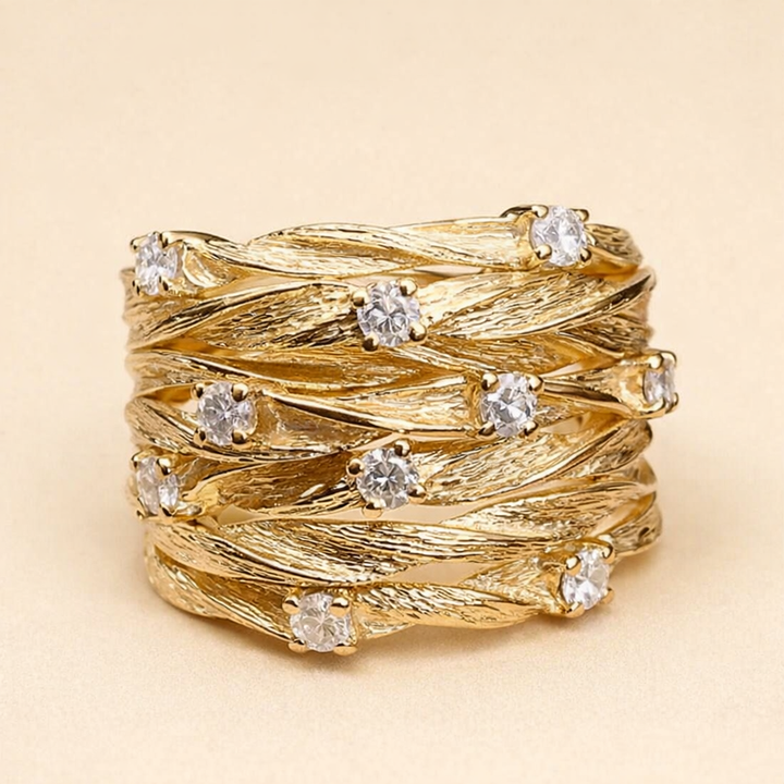 Elegant guldring med raffinerede detaljer
