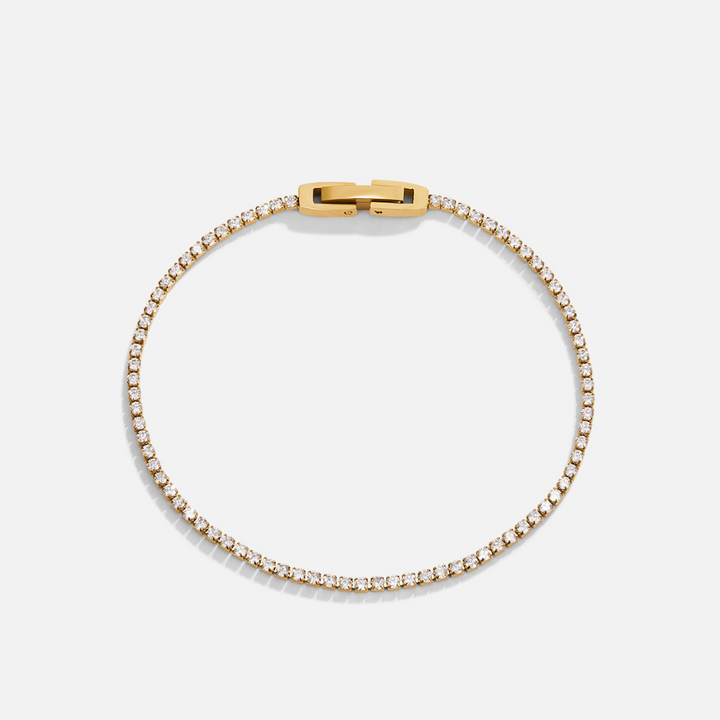Elegant guldarmbånd med funklende krystaller