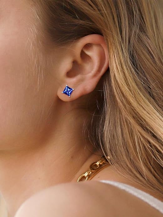 Elegante øreringe i hvidguld med safir i prinsessesliben