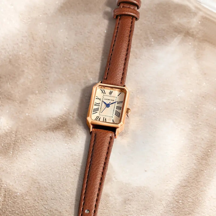 Elegant guldur med en raffineret lille sten