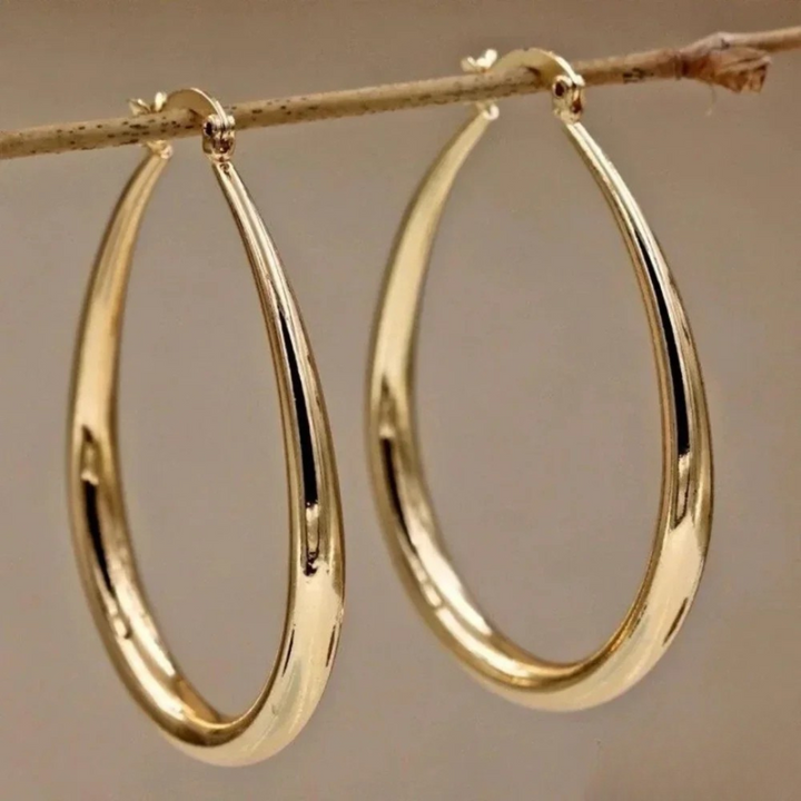Stilfulde guldcreoler med glat finish