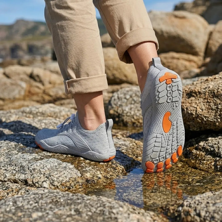 Barfodssneakers til kvinder med bred tåboks og fleksibel sål
