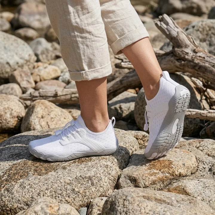 Barfodssneakers til kvinder med bred tåboks og fleksibel sål