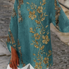 Gylden blomsterbluse med lange ærmer