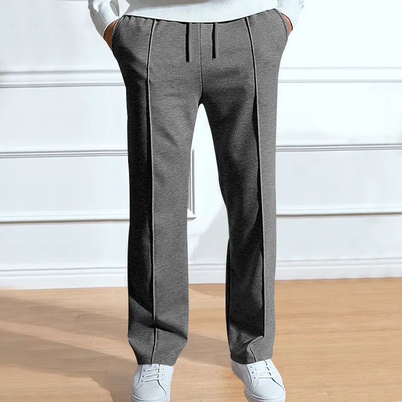Slim fit-bukser med elastisk linning og snor til mænd