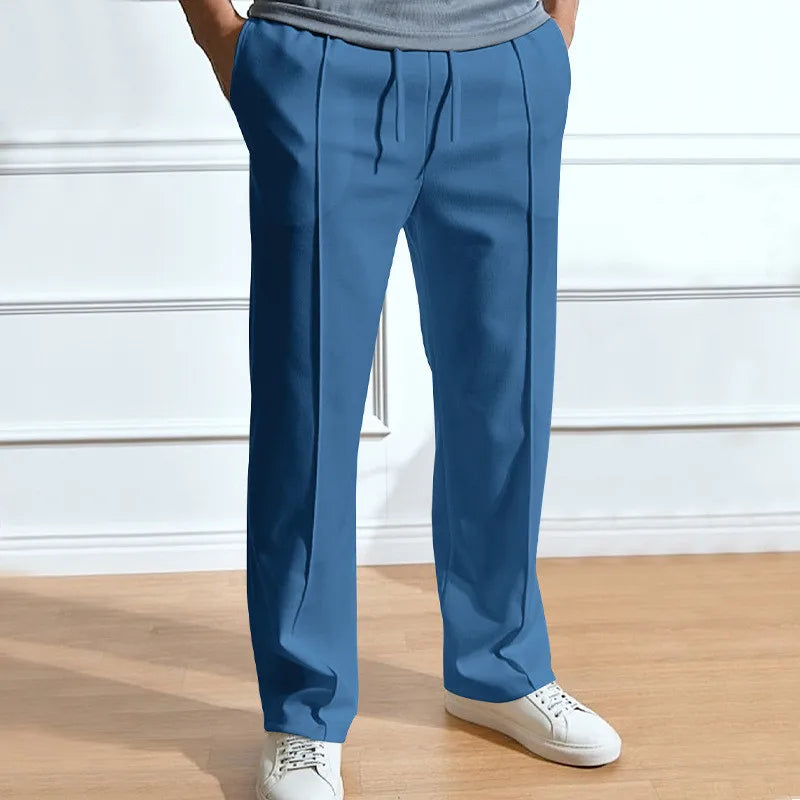 Slim fit-bukser med elastisk linning og snor til mænd