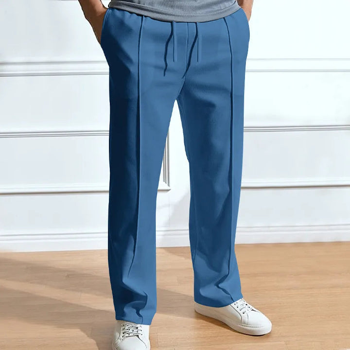 Slim fit-bukser med elastisk linning og snor til mænd