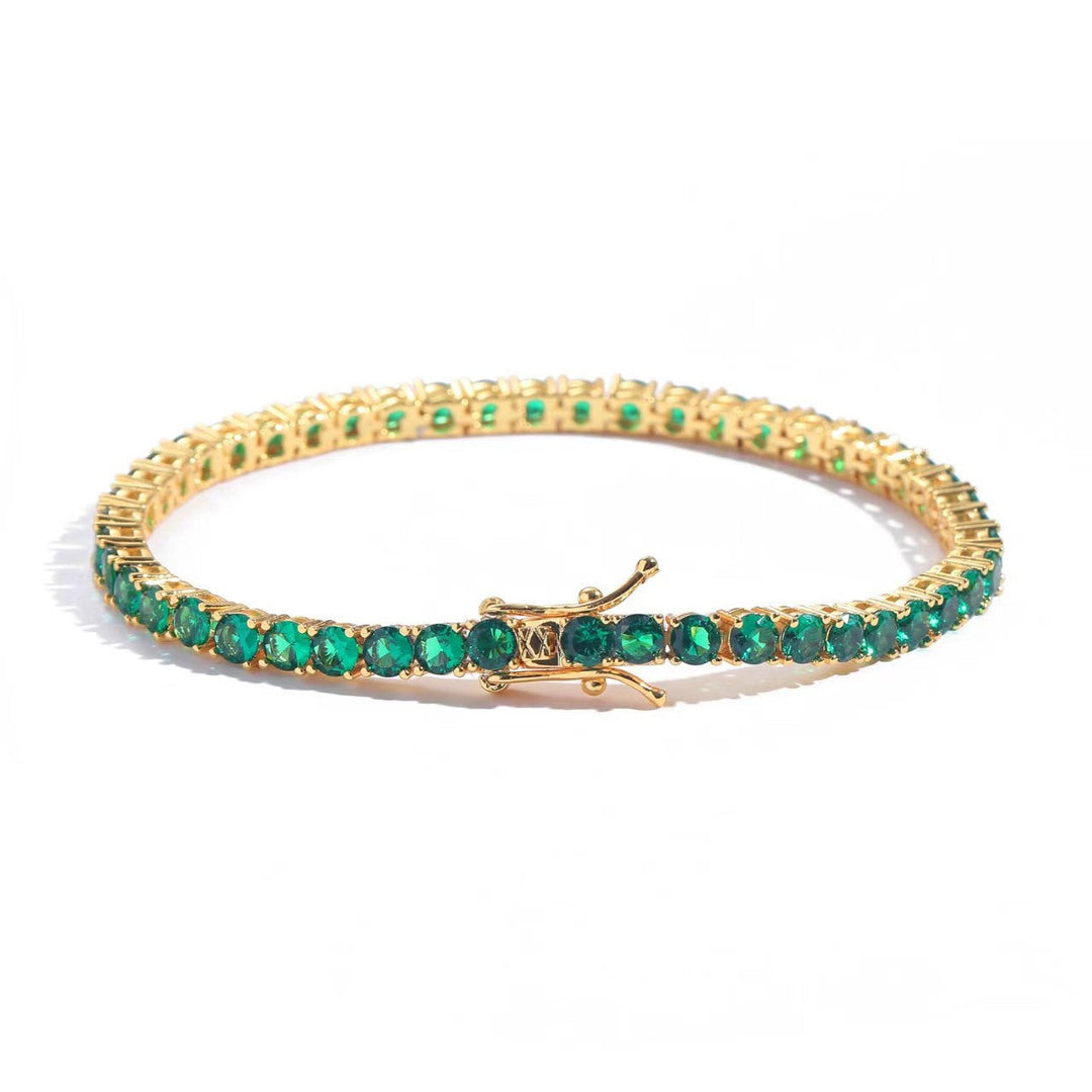 Elegant guldfarvet armbånd med raffinerede detaljer