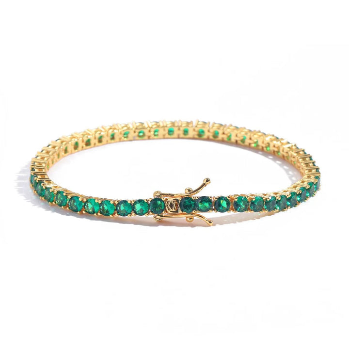Elegant guldfarvet armbånd med raffinerede detaljer