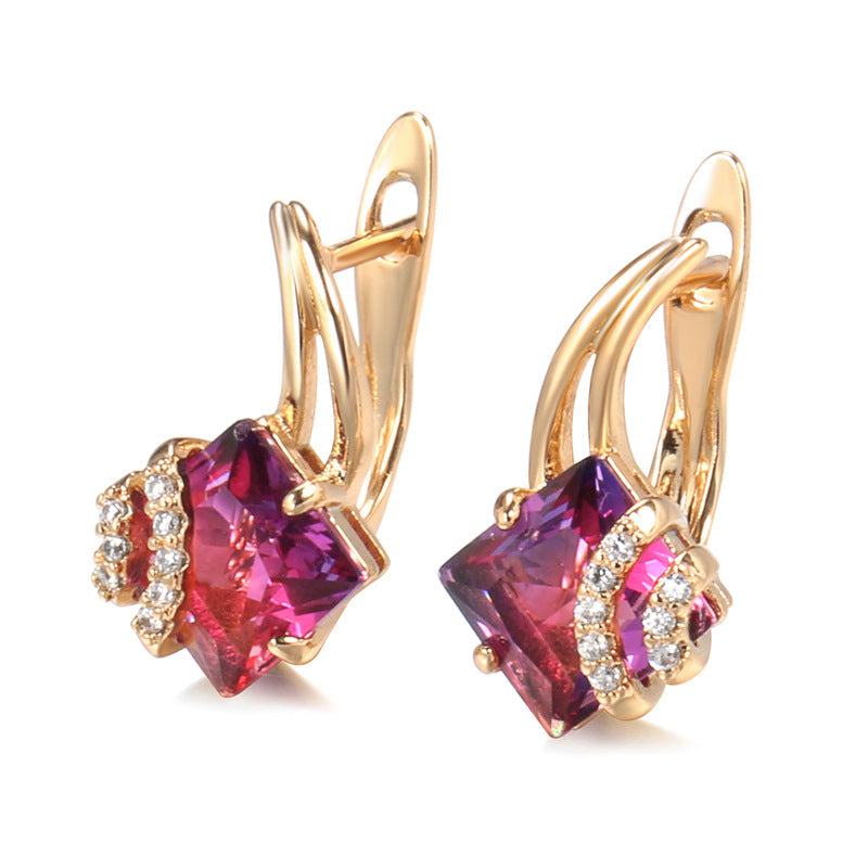 Elegante øreringe i roseguld med firkantet zirkonia