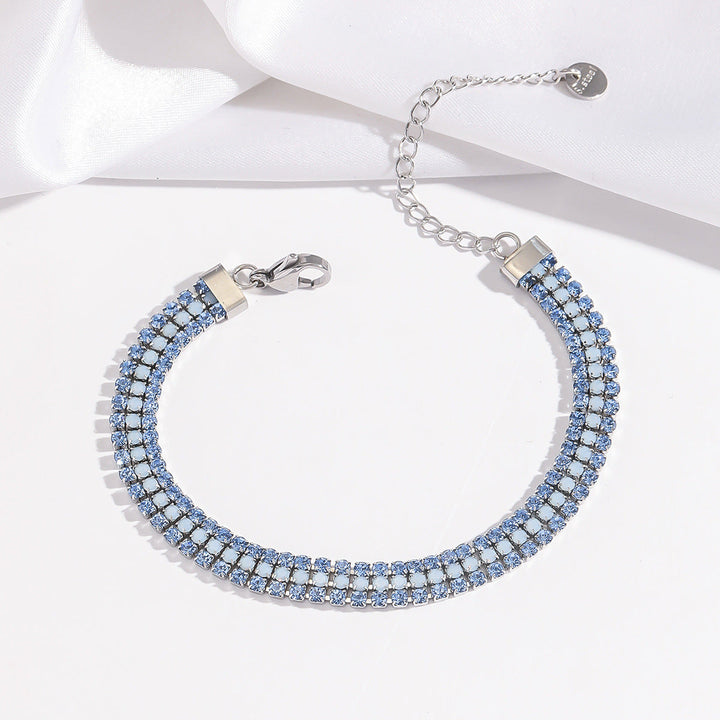Elegant armbånd i hvidguld med raffineret glans