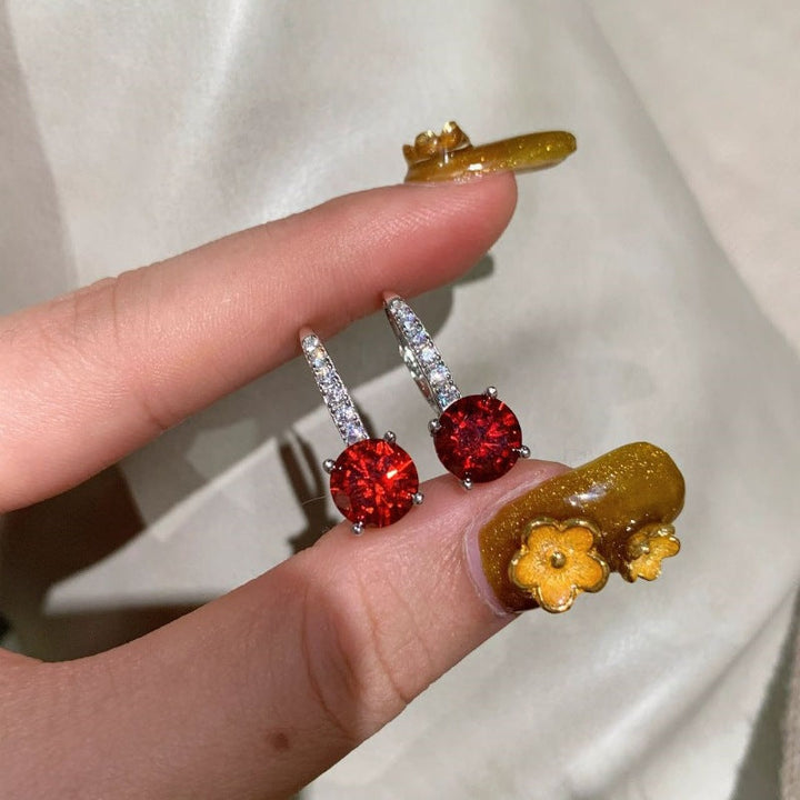 Elegante øreringe i hvidguld med raffinerede detaljer