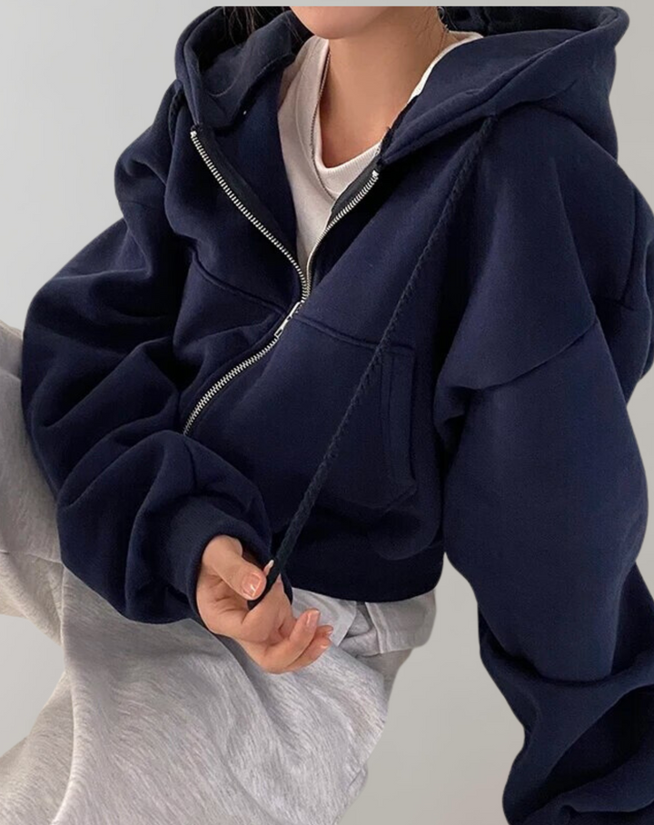 Hoodie til damer med lynlås og hætte med snoretræk samt ribbede manchetter