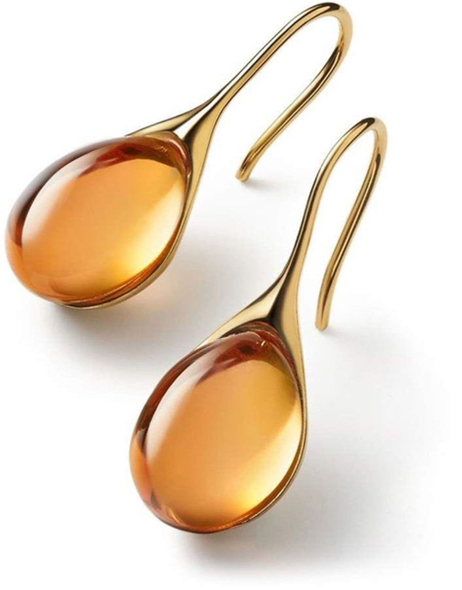 Elegante øreringe i guld med funklende krystaller