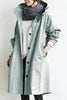 Oversized vandtæt trenchcoat med hætte