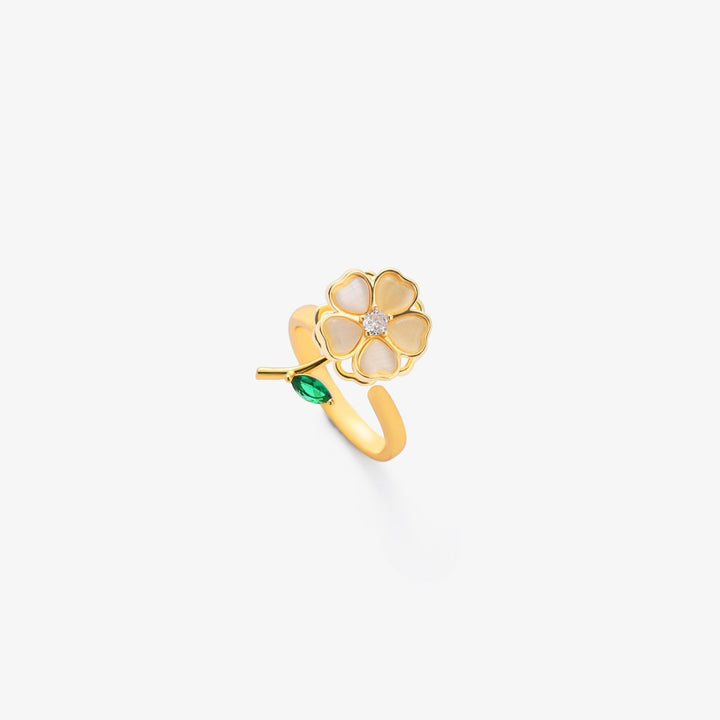 Elegant guldring med drejende blade