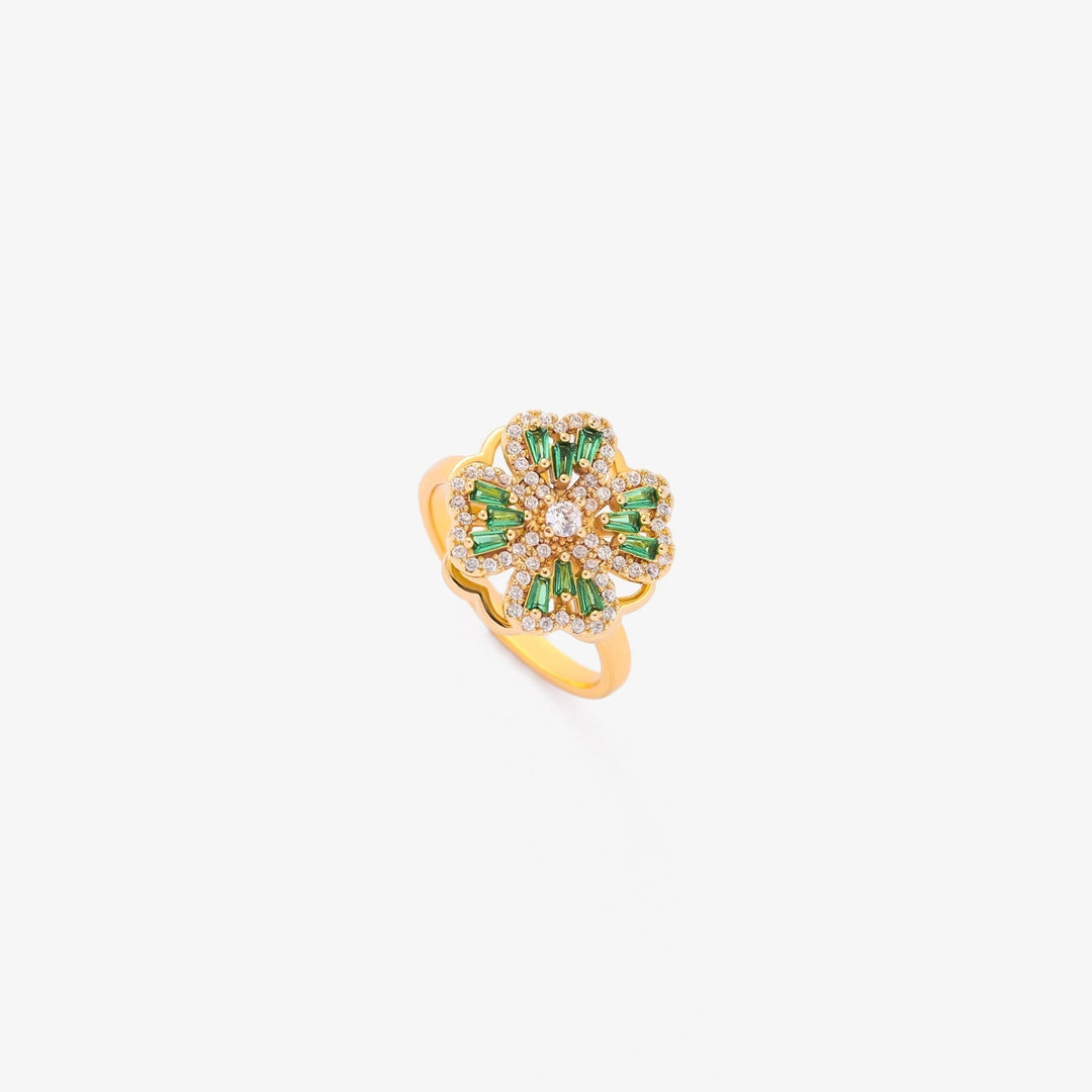 Elegant guldring med drejende kløverblad