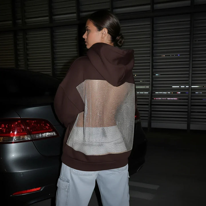 BackStageGlow | Når lyset tændes, dominerer denne hoodie ikke bare rummet, den skinner