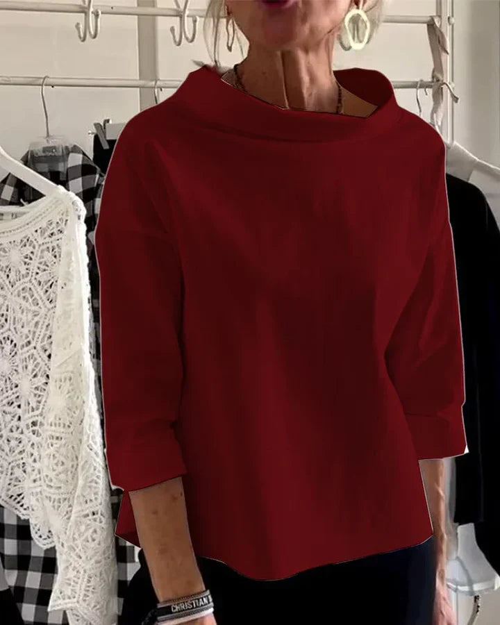 Casual top med brede revers og halv rullekrave for et stilfuldt look