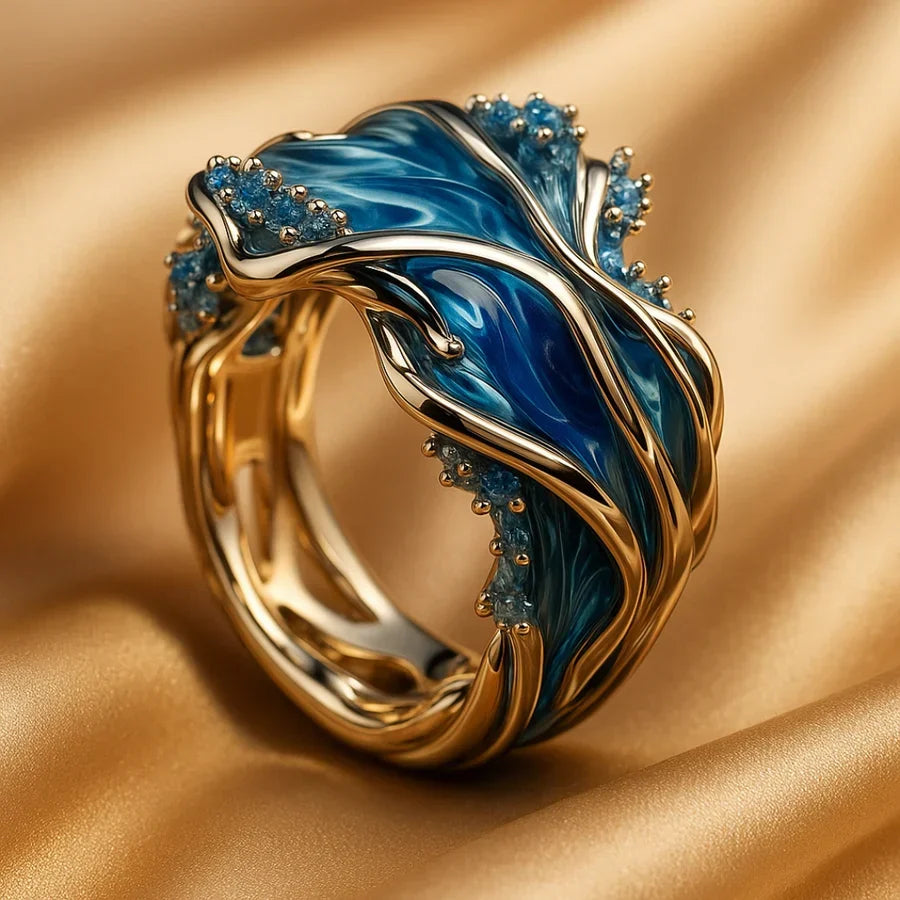 Elegant guldring med bølgemotiv
