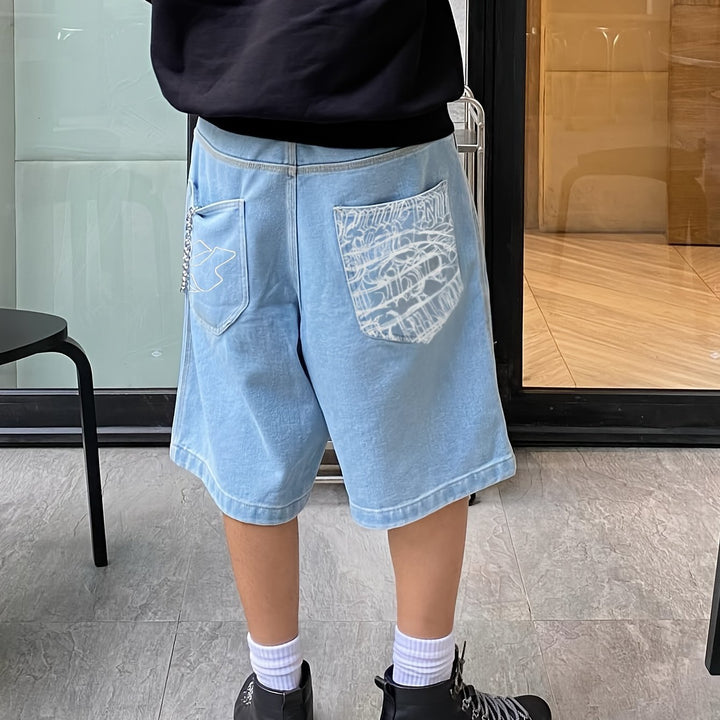 Afslappede bermudashorts i denim – løs pasform med elegant blomsterbroderi