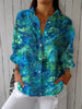 Peacock Grace-bluse – farverig overdel med påfuglefjerprint