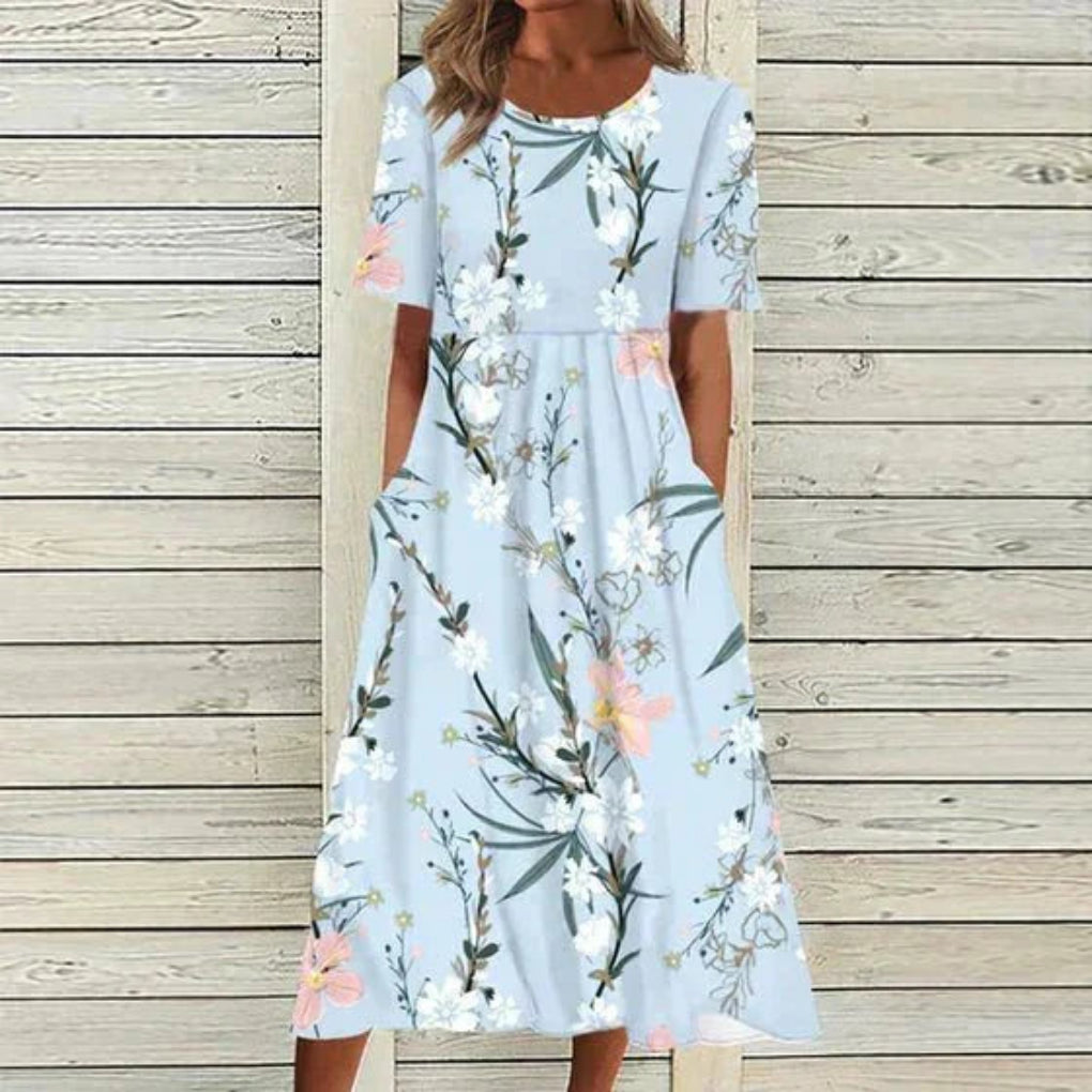 https://cdn.shopify.com/s/files/1/0575/0731/5784/files/blomstret-maxi-kjole-i-gul-og-lysebla-elegant-og-afslappet-stil-perfekt-til-bade-formelle-og-afslapp-3.webp?v=1748707529