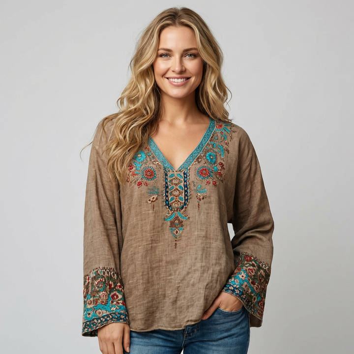 Damebluse med broderi