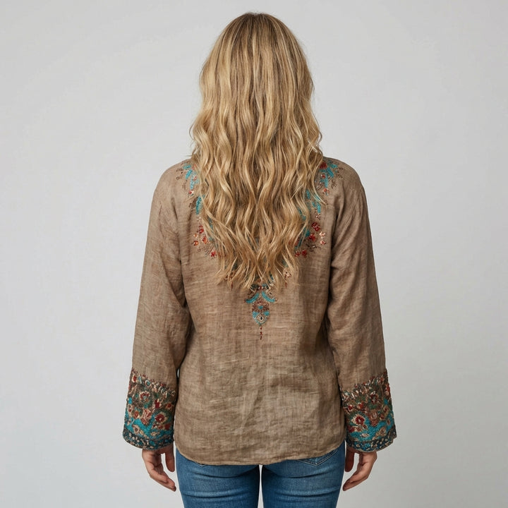 Damebluse med broderi