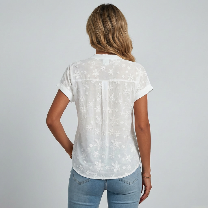 Kortærmet bluse med blomsterprint til kvinder
