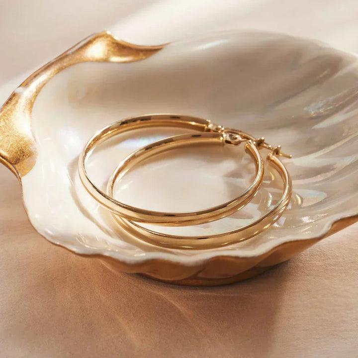 Elegante øreringe i hvidguld med raffinerede detaljer