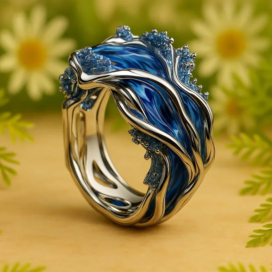 Elegant guldring med bølgemotiv