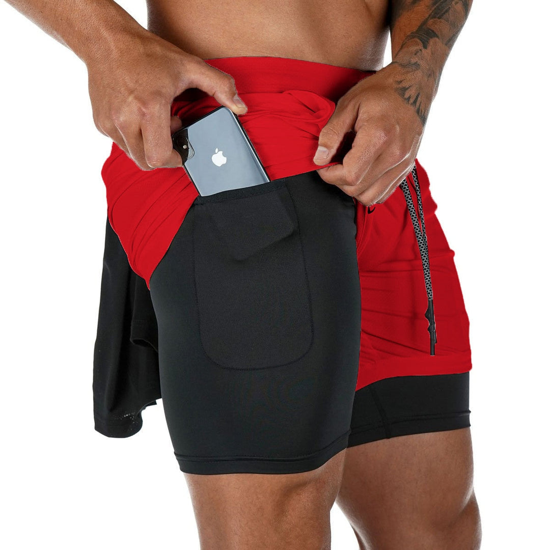 https://cdn.shopify.com/s/files/1/0575/0731/5784/files/m-nds-2-i-1-tr-ningsshorts-med-mobillomme-ideelle--3.jpg?v=1778637518