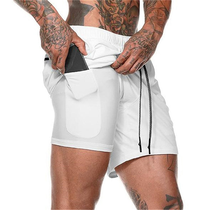 https://cdn.shopify.com/s/files/1/0575/0731/5784/files/m-nds-2-i-1-tr-ningsshorts-med-mobillomme-ideelle--5.jpg?v=1778637524
