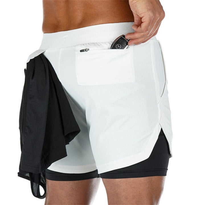 https://cdn.shopify.com/s/files/1/0575/0731/5784/files/m-nds-2-i-1-tr-ningsshorts-med-mobillomme-ideelle--7.jpg?v=1778637529